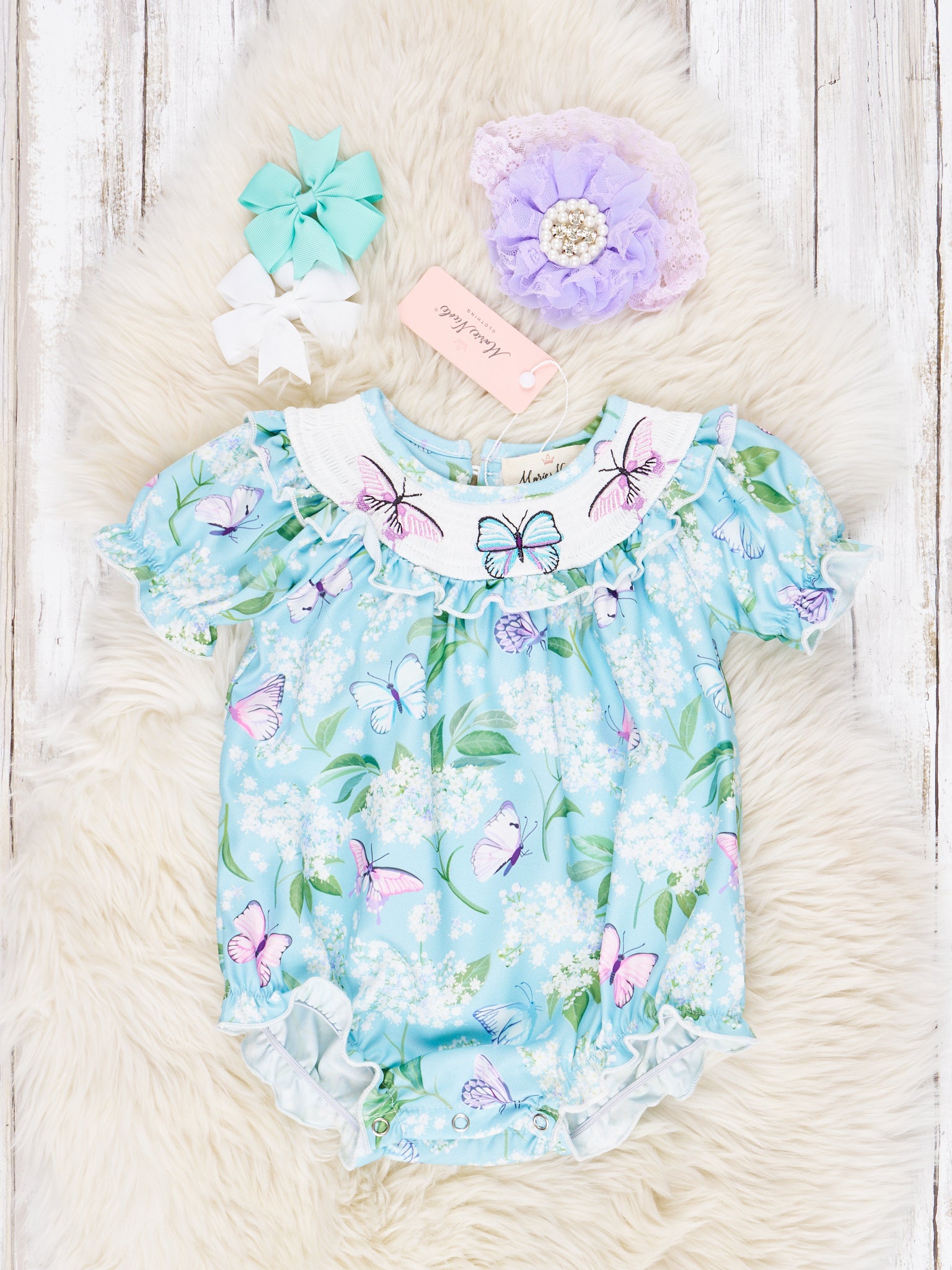 Smocked Blue Butterfly Romper - Marie Nicole Clothing