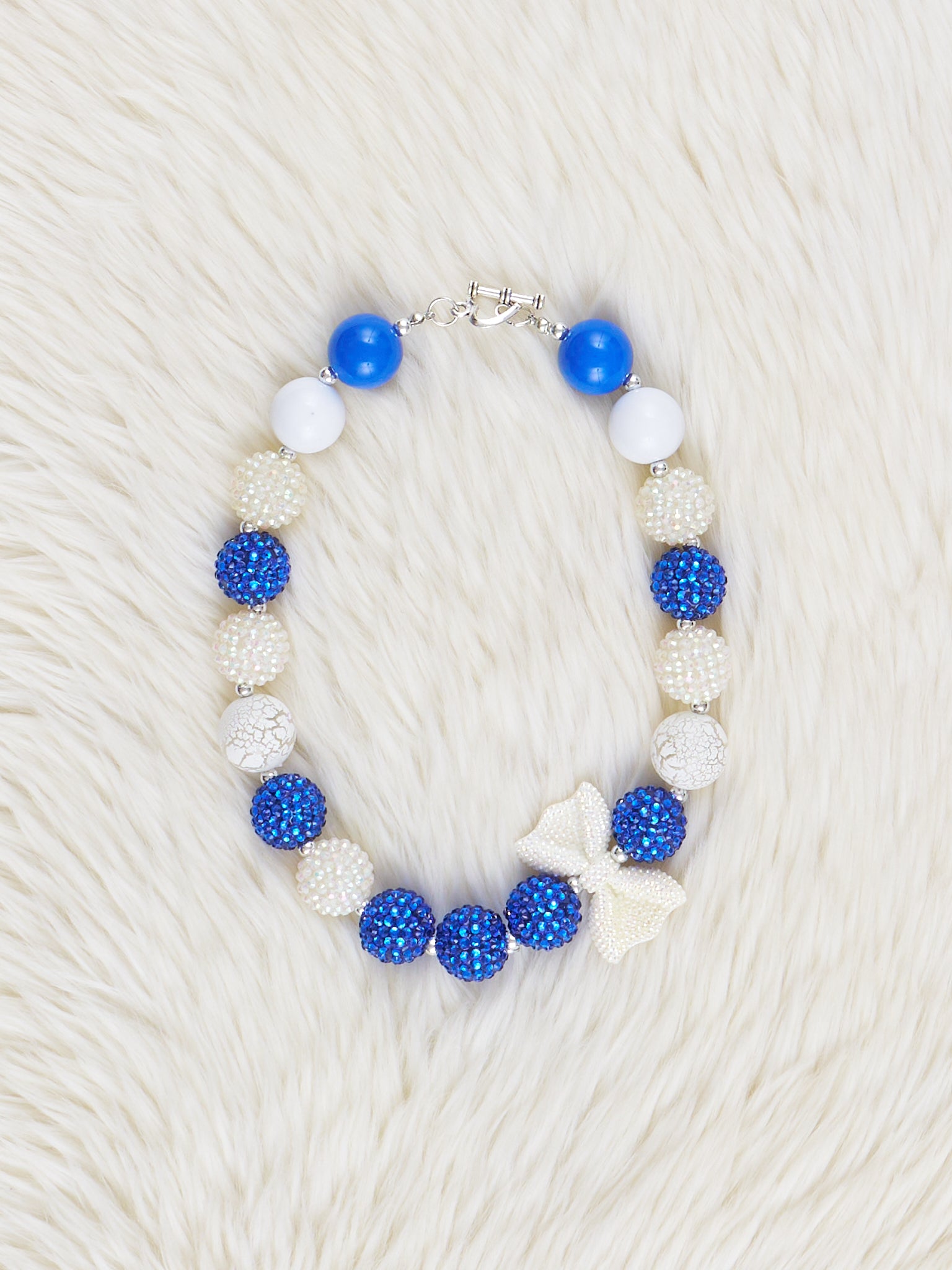 Blue & White Sparkle Bow Charm Bubblegum Necklace - Marie Nicole Clothing