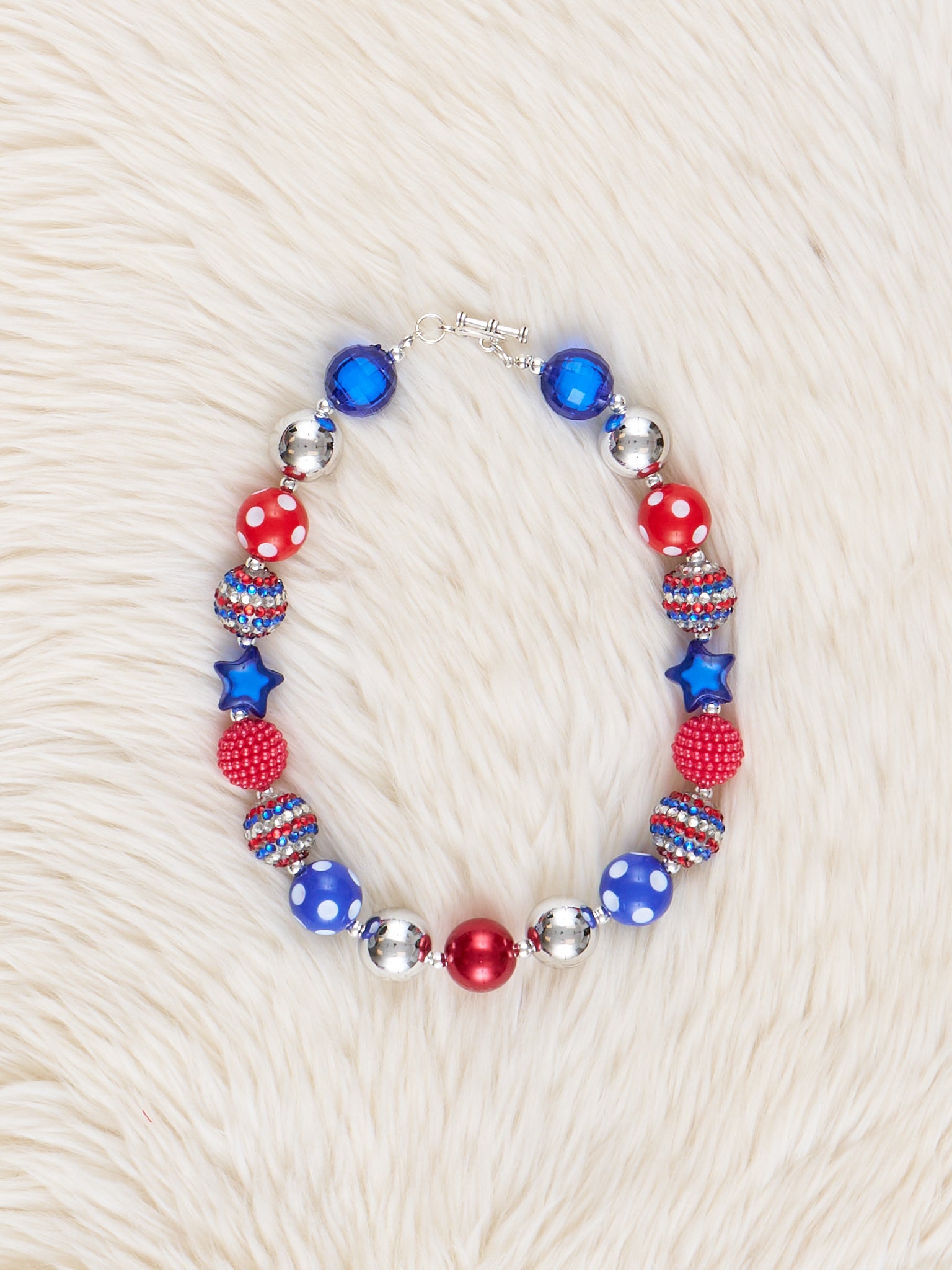 Red & Blue Star Sparkle Charm Bubblegum Necklace - Marie Nicole Clothing