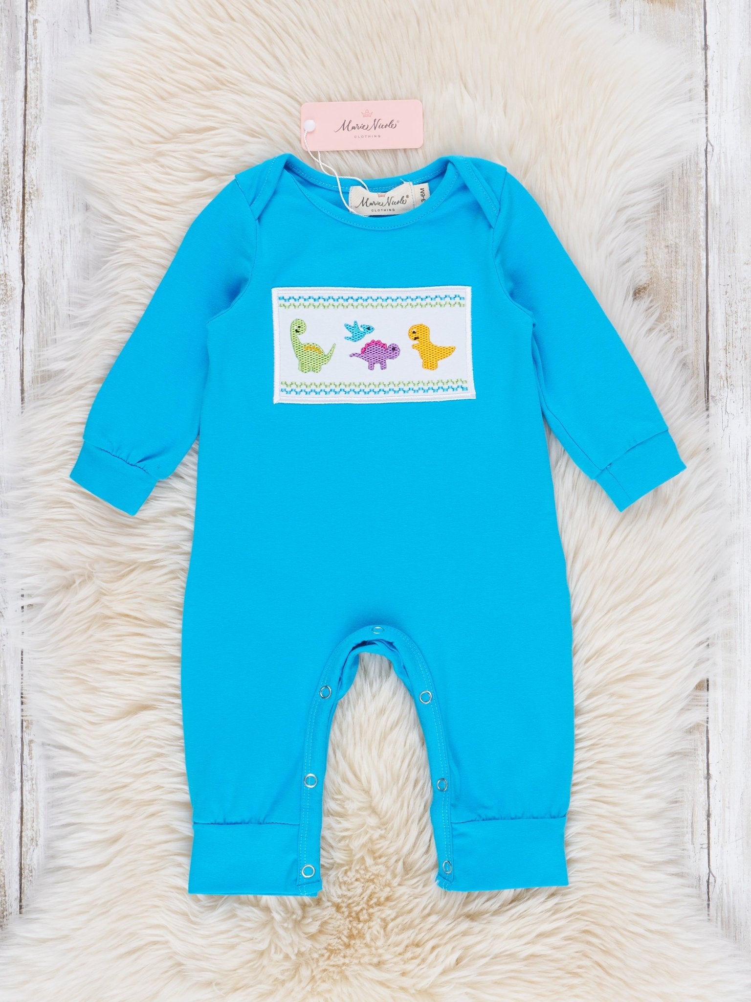 Blue Smocked Dinosaurs Romper - Marie Nicole Clothing