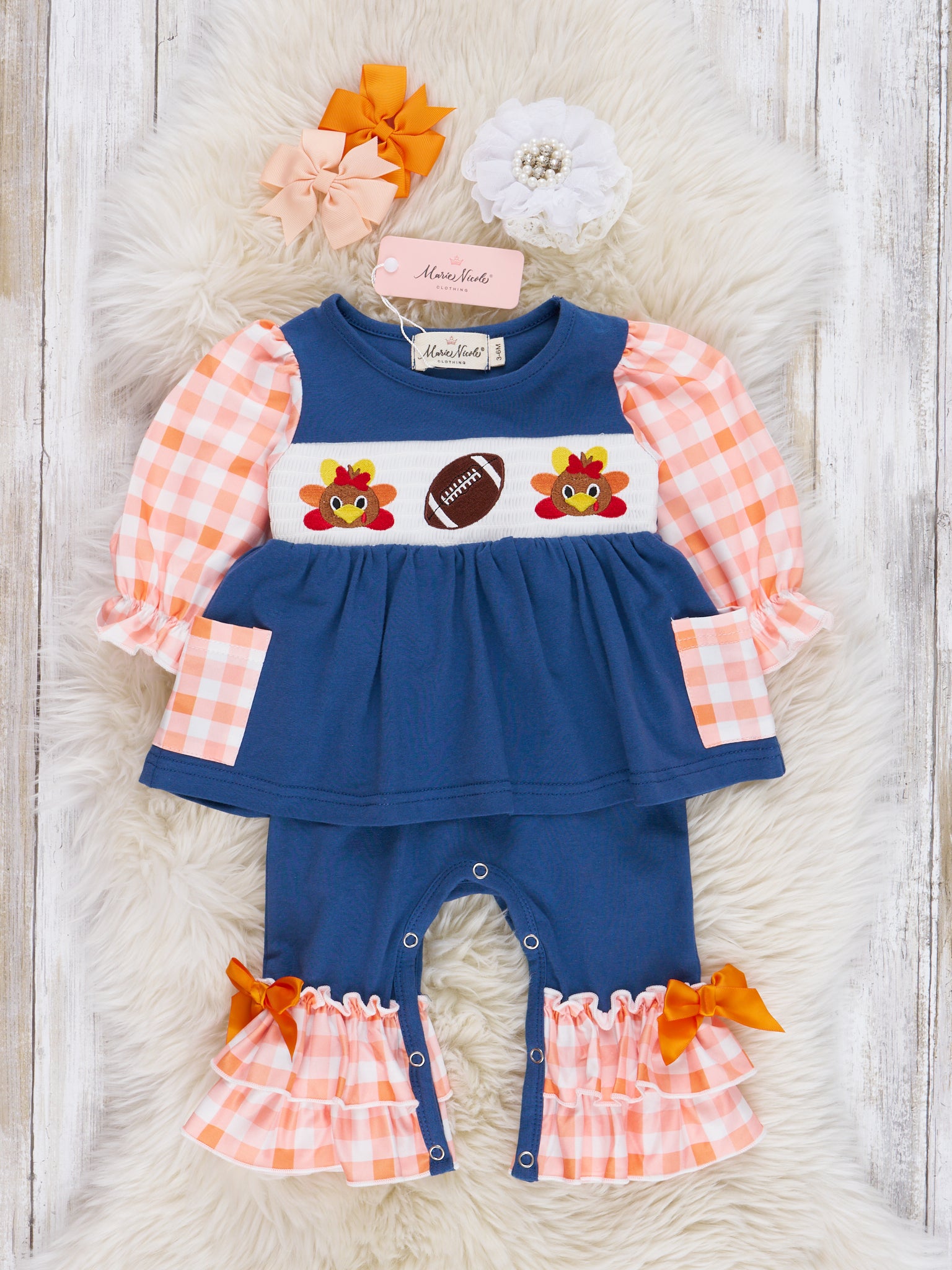 Navy & Orange Plaid Smocked Football Ruffle Romper - Marie Nicole Clothing