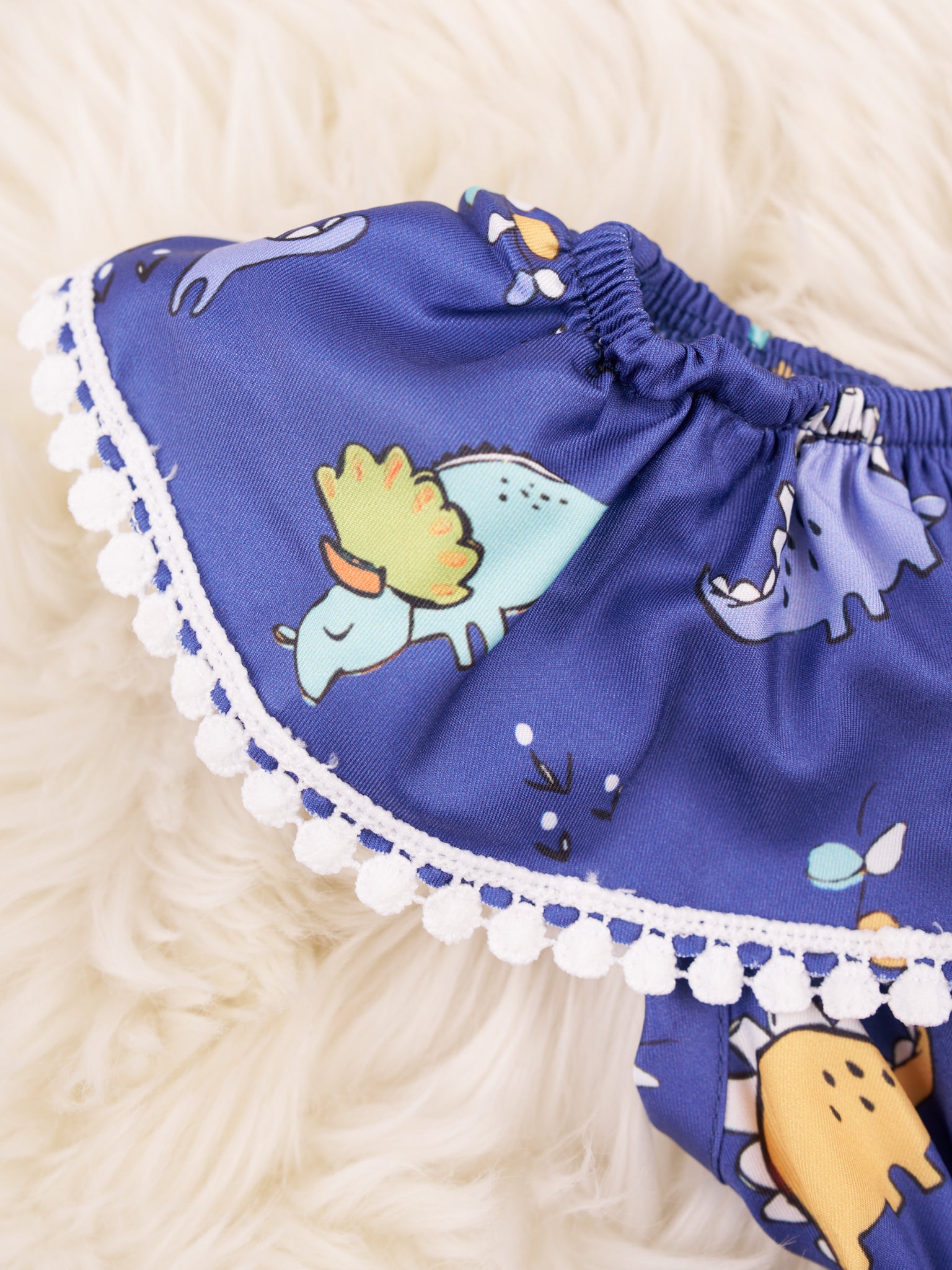 Dark Blue Dinosaur Ruffle Romper - Marie Nicole Clothing