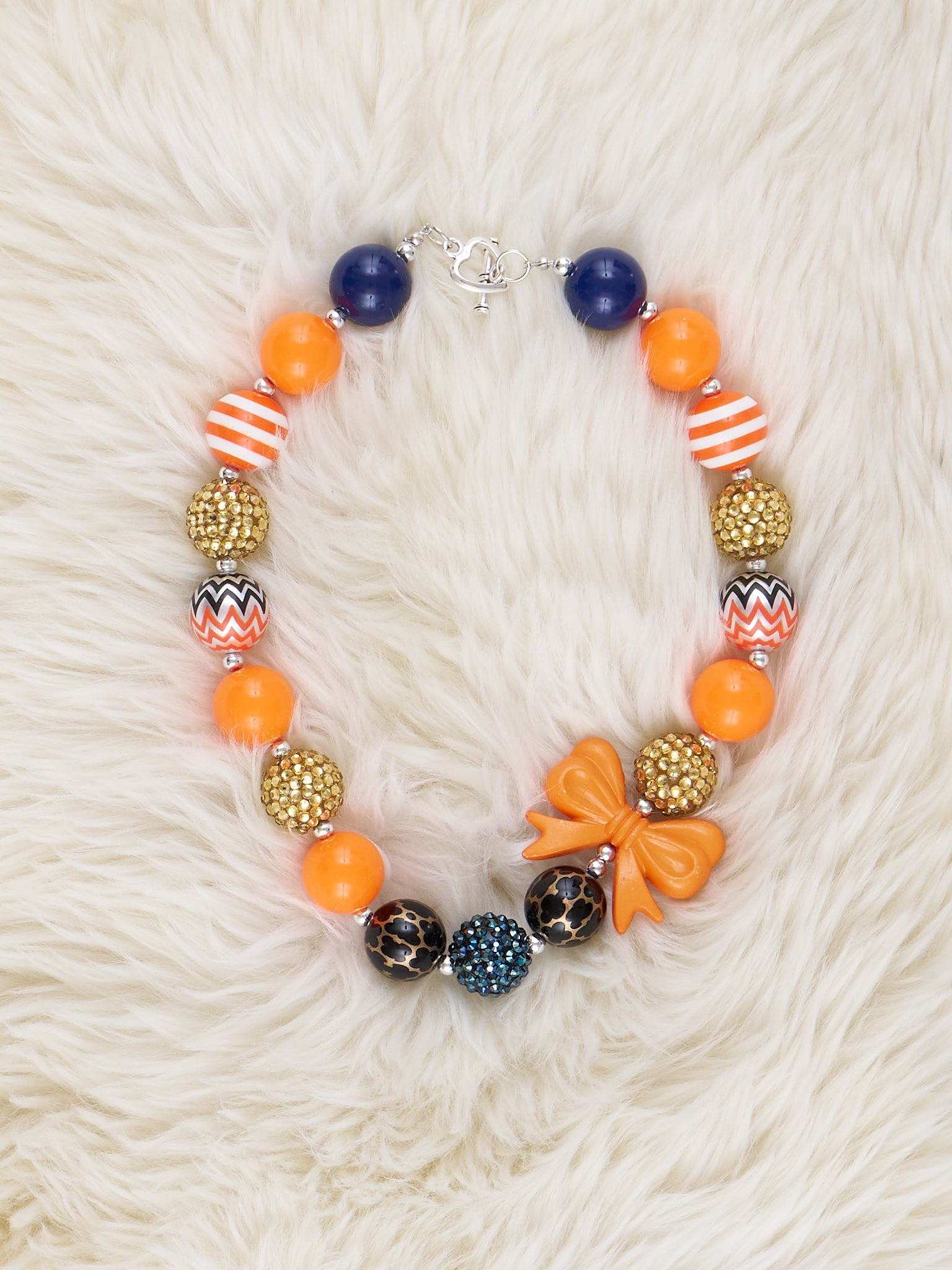 Gold & Orange Bow Charm Bubblegum Necklace - Marie Nicole Clothing