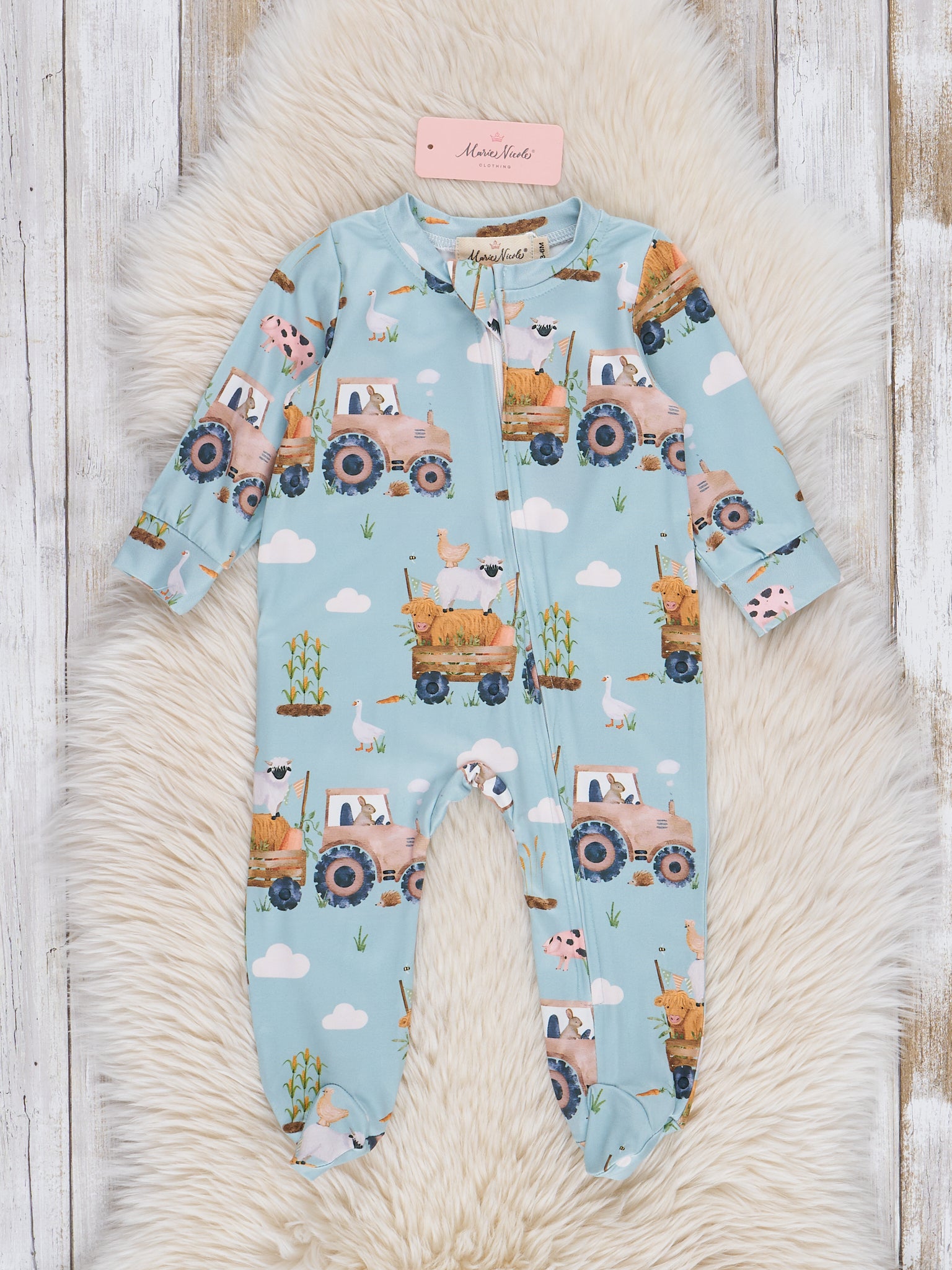 Light Blue Tractor Footed Sleeper Pajamas - Marie Nicole Clothing