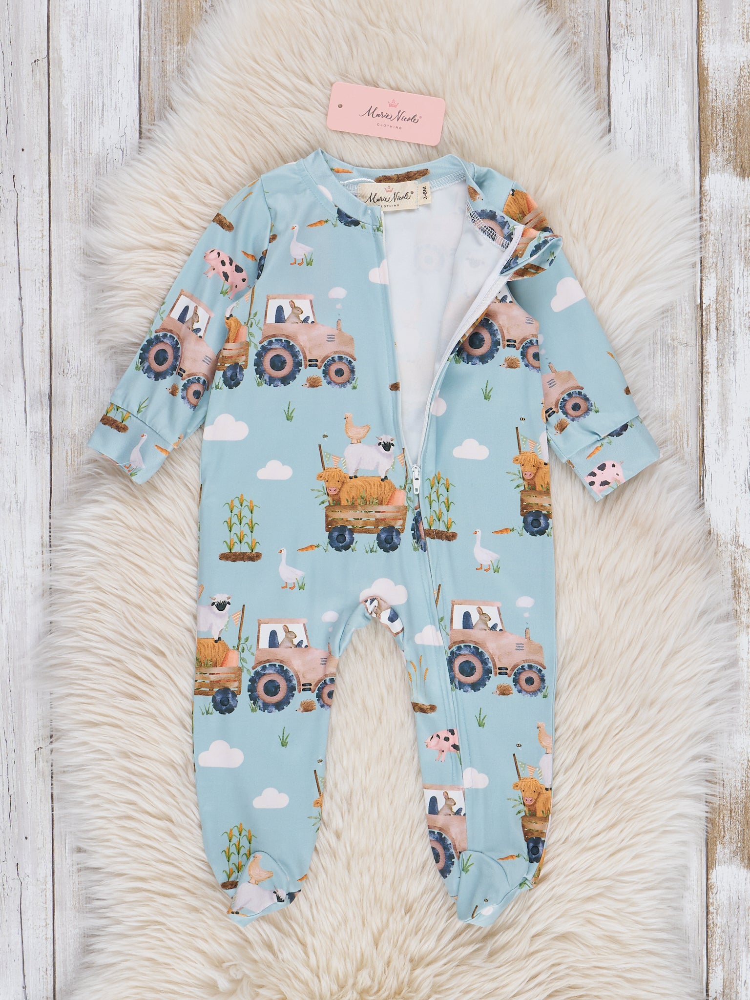 Light Blue Tractor Footed Sleeper Pajamas - Marie Nicole Clothing