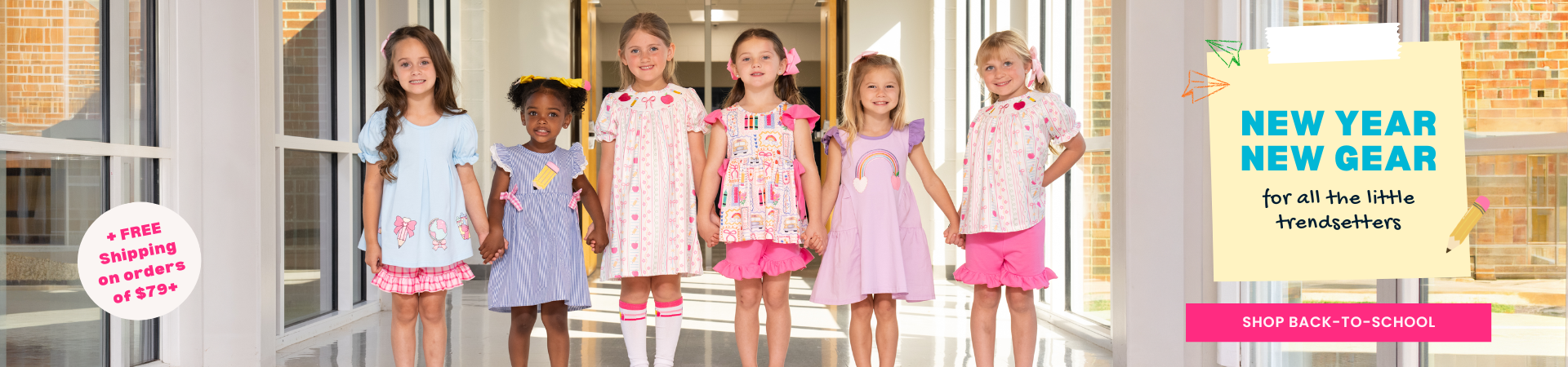 Young girls wearing back to school outfits in school hallway - shop back to school + free shipping on orders of $79 or more