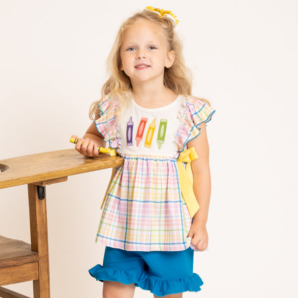 young girl wearing back to school crayon outfit