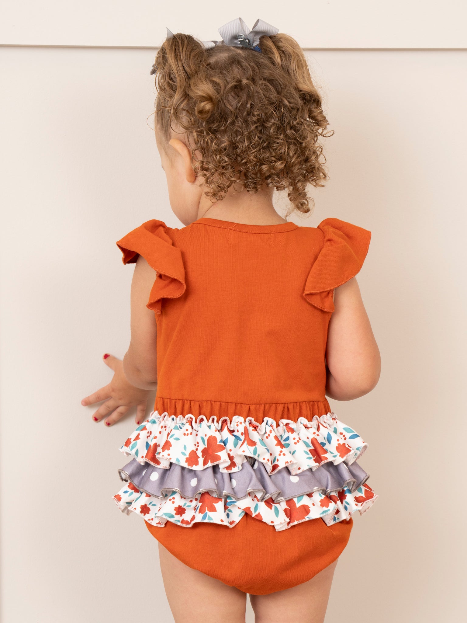 TX Burnt Orange Floral Ruffle Bubble Romper - Marie Nicole Clothing