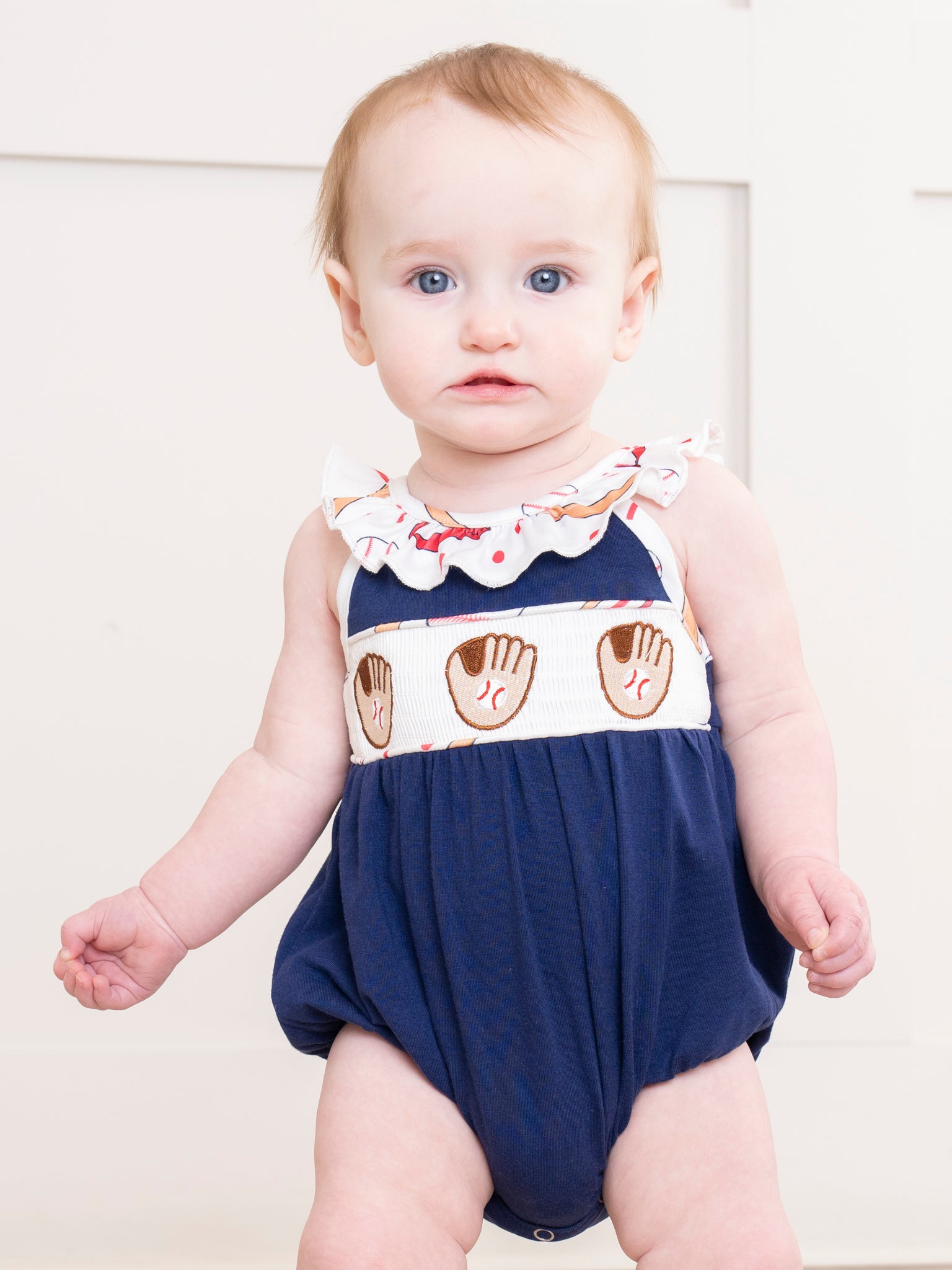 Navy & White Smocked Baseball Ruffle Bubble Romper - Marie Nicole Clothing