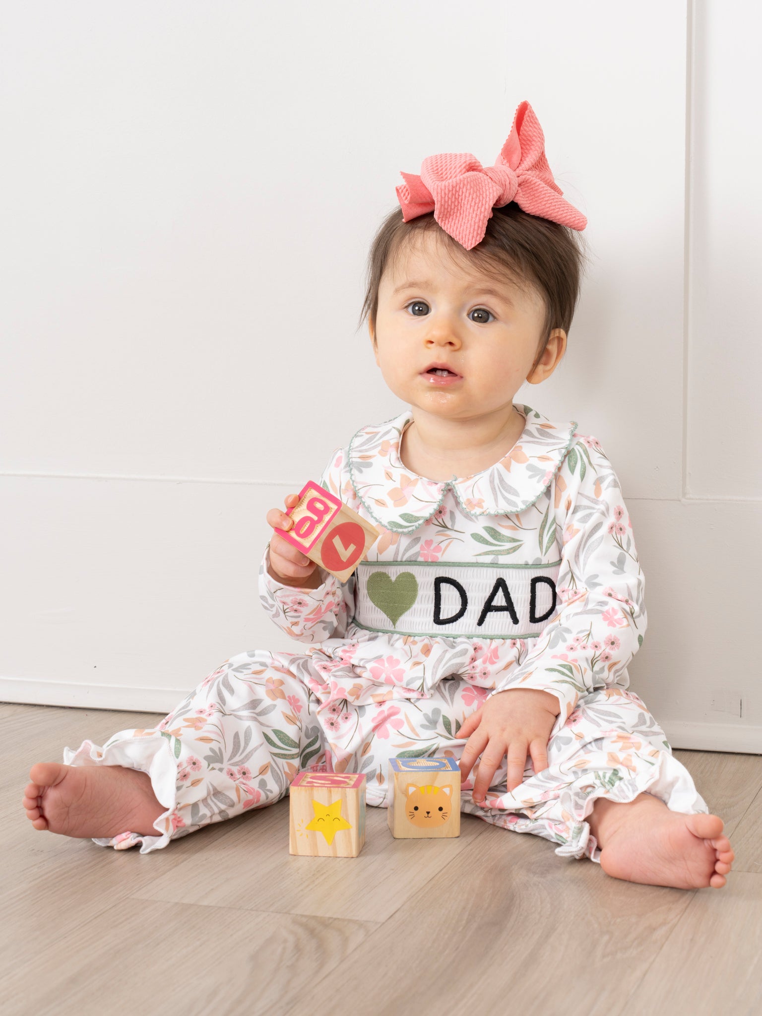 Sweet Olive Floral Smocked Dad Love Ruffle Romper - Marie Nicole Clothing