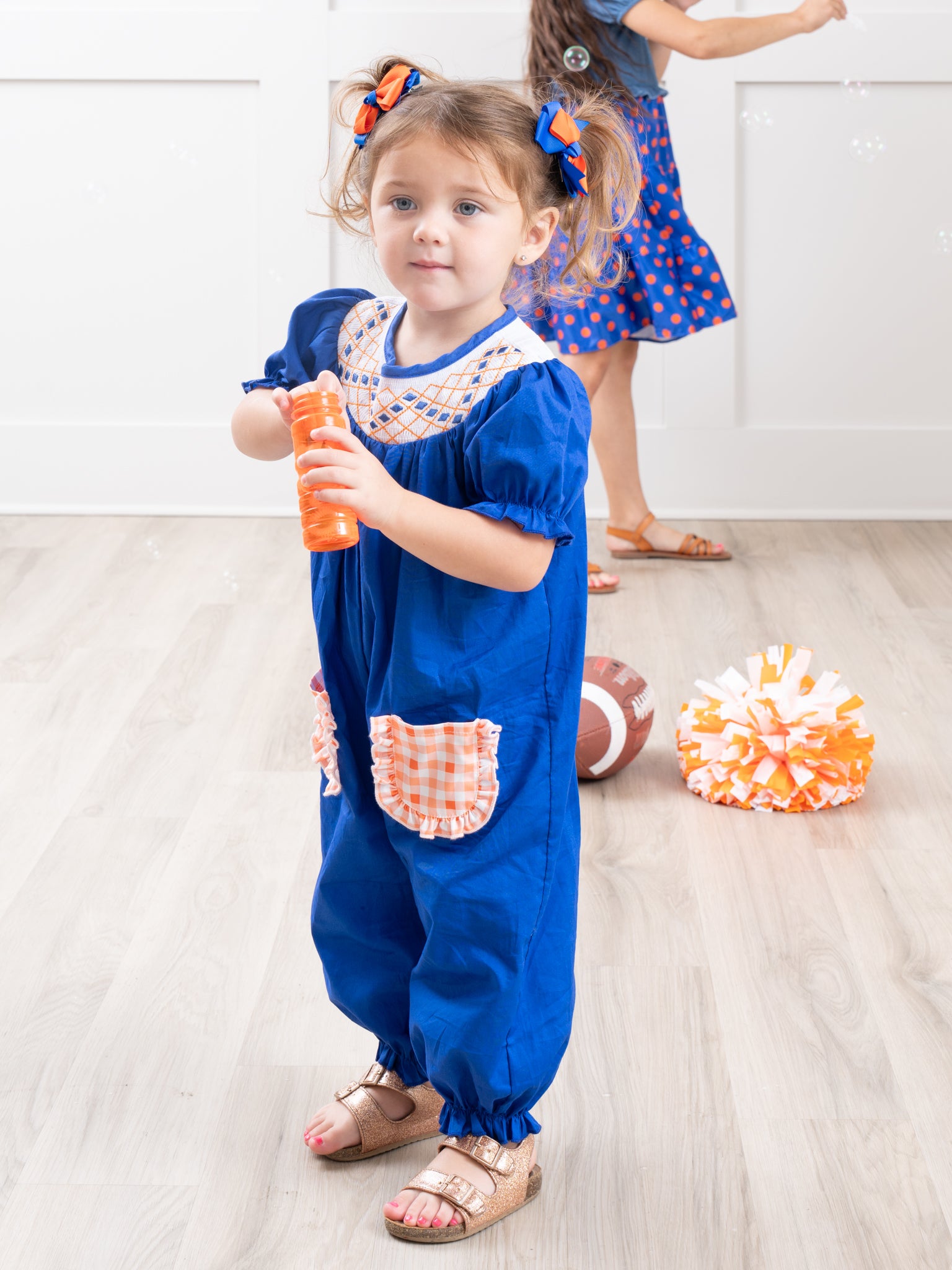 Blue & Orange Smocked Gingham Ruffle Romper - Marie Nicole Clothing