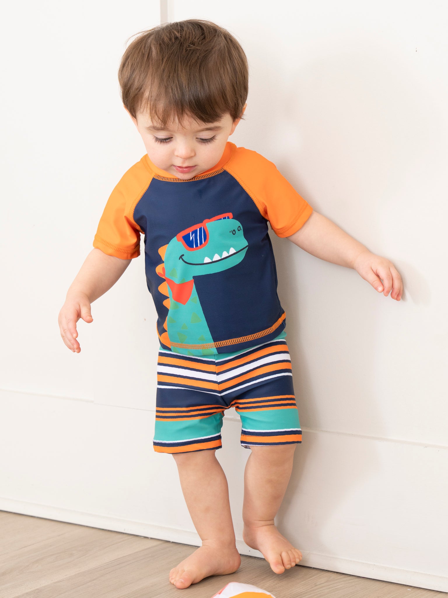 Navy Striped Dino Rash Guard & Swim Shorts - Marie Nicole Clothing