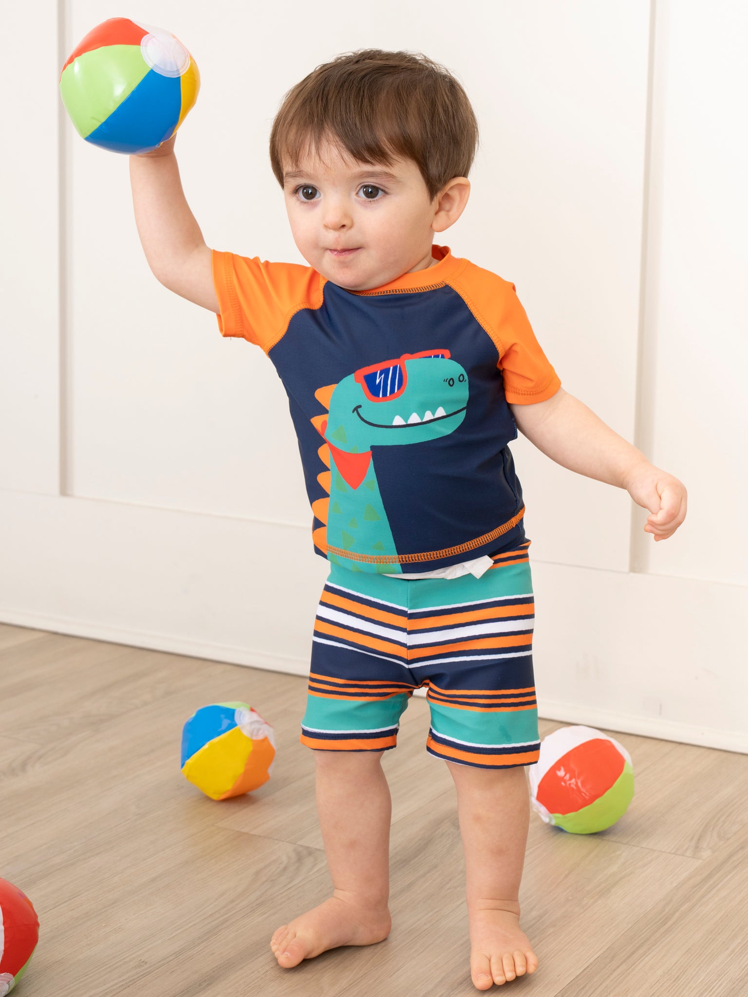 Navy Striped Dino Rash Guard & Swim Shorts - Marie Nicole Clothing