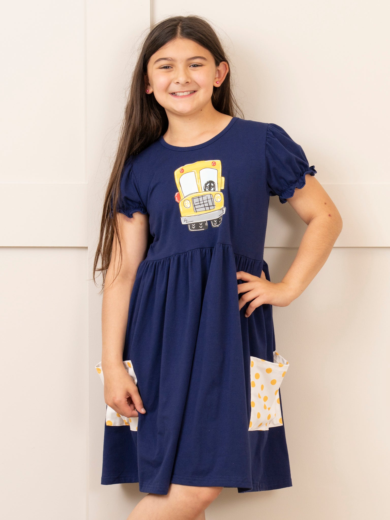 Navy Wheels on the Bus Ruffle Dress - Marie Nicole Clothing