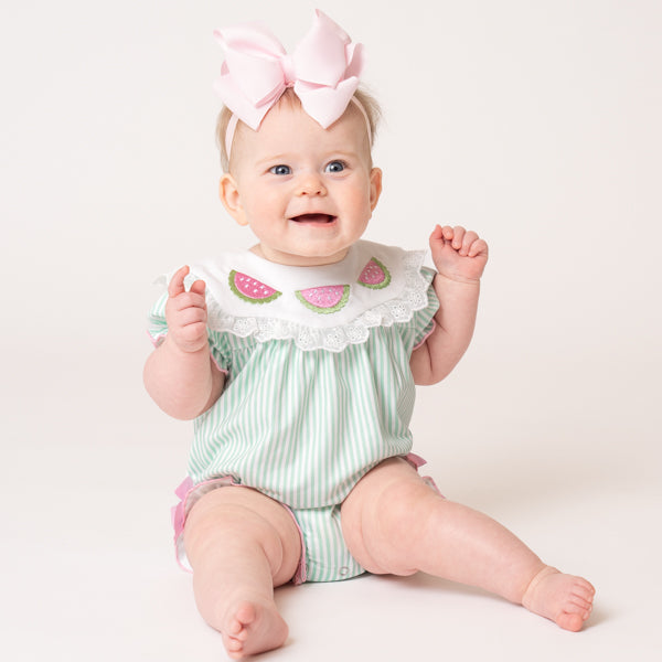 baby wears watermelon onesie 