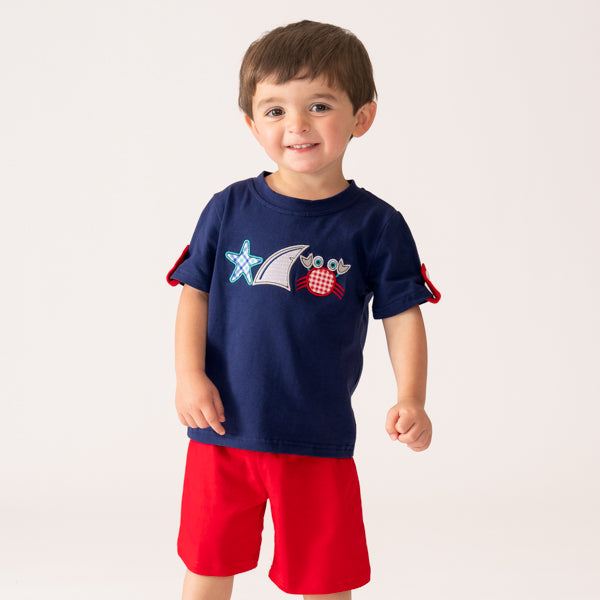 young boy wears crab outfit