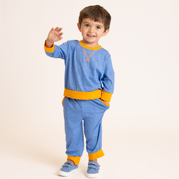 young boy wearing fall outfit