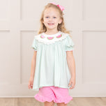 young girl wears watermelon summer outfit
