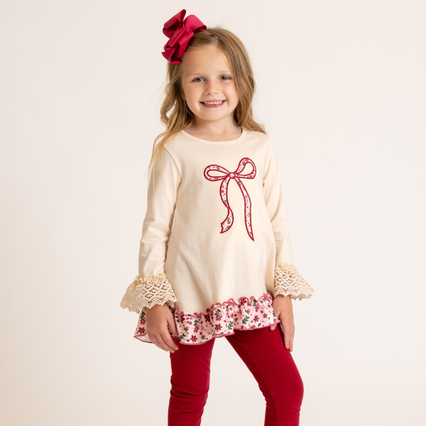 young girl wears fall ribbon outfit