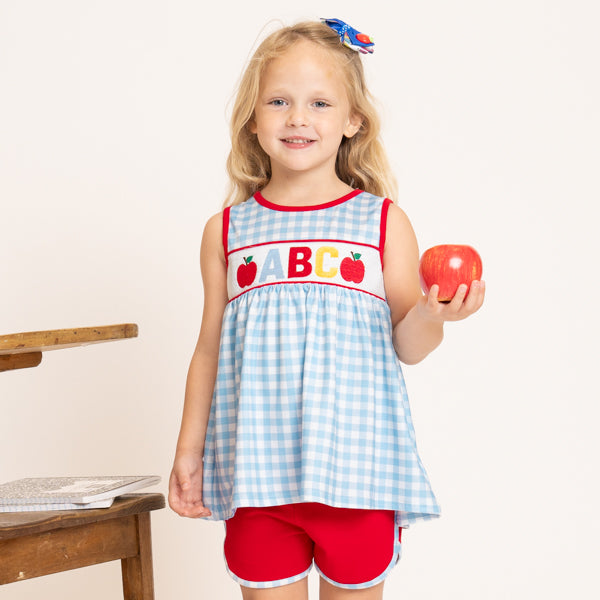 young girl wears back to school outfit