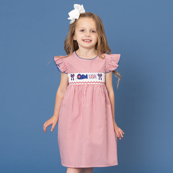 young girl wearing USA dress