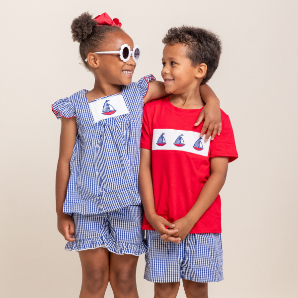 boy and girl wearing matching sibling set