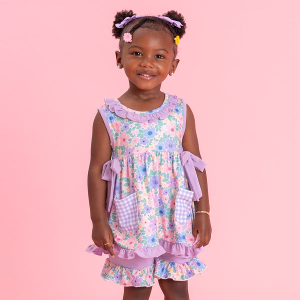 young girl wears floral matching set