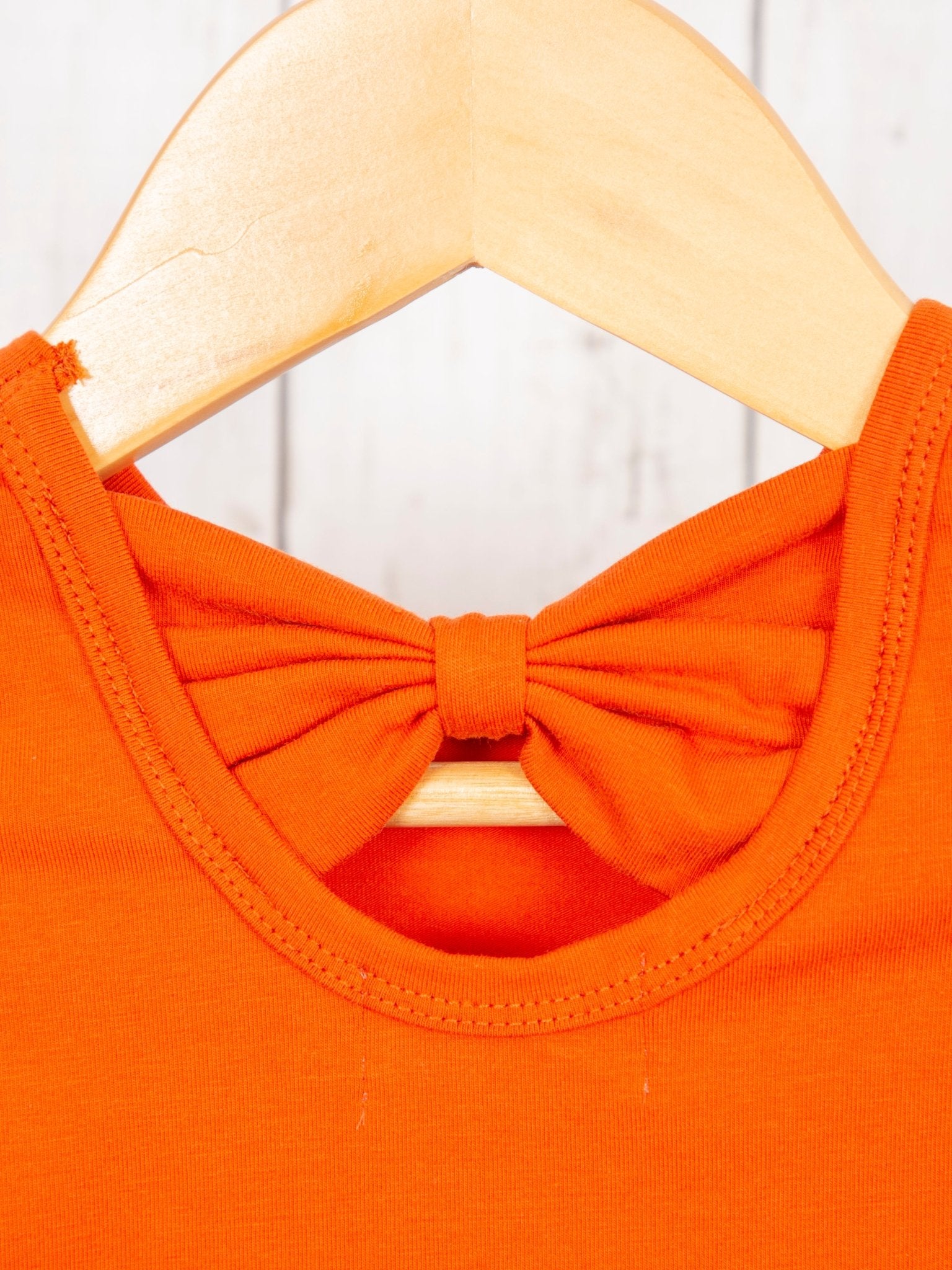 Cotton Bow Back Button Ruffle Sleeve Peplum Top - Bright Colors - Marie Nicole Clothing