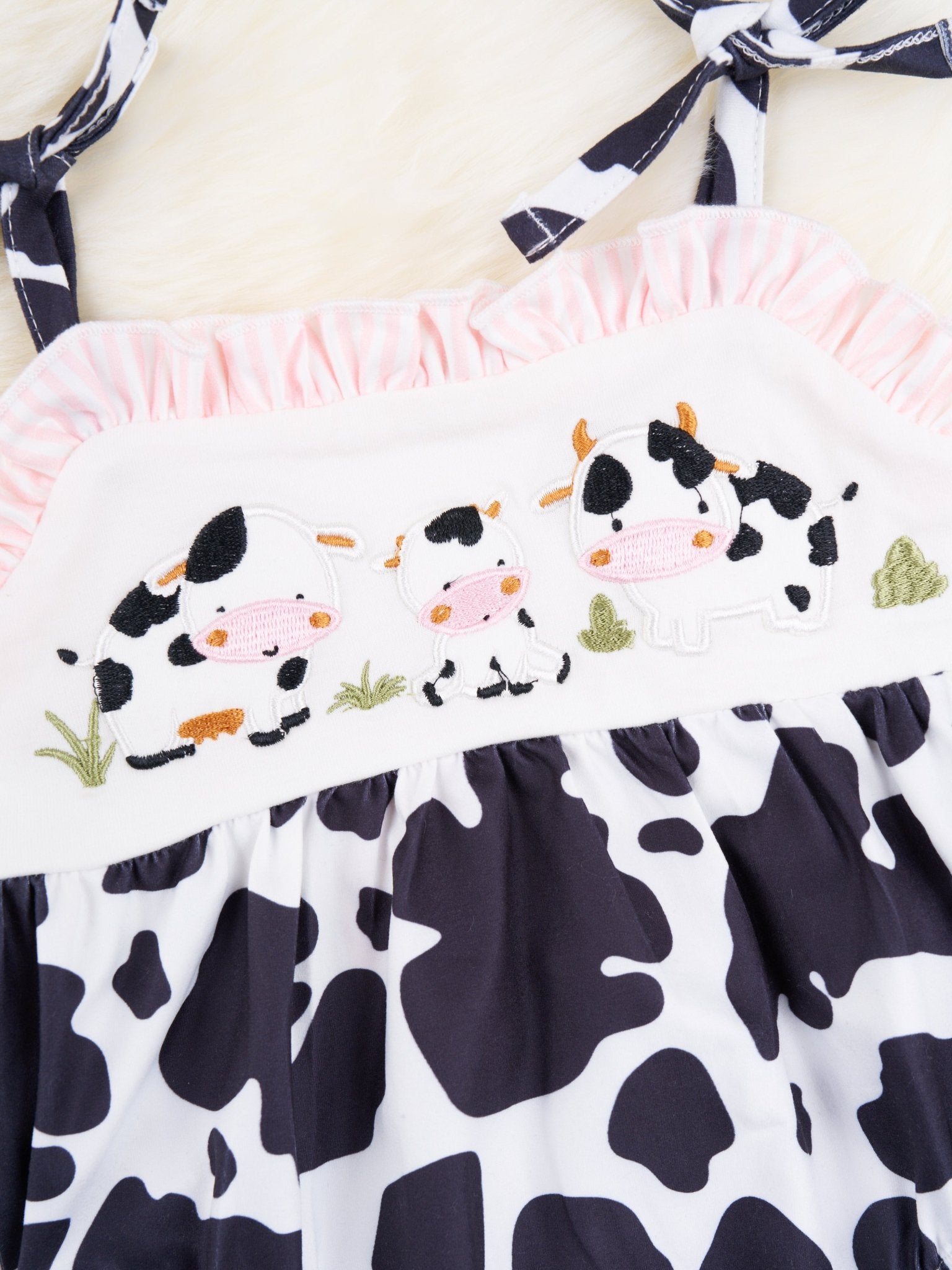 Smocked Cow Tie Bubble Romper - Marie Nicole Clothing