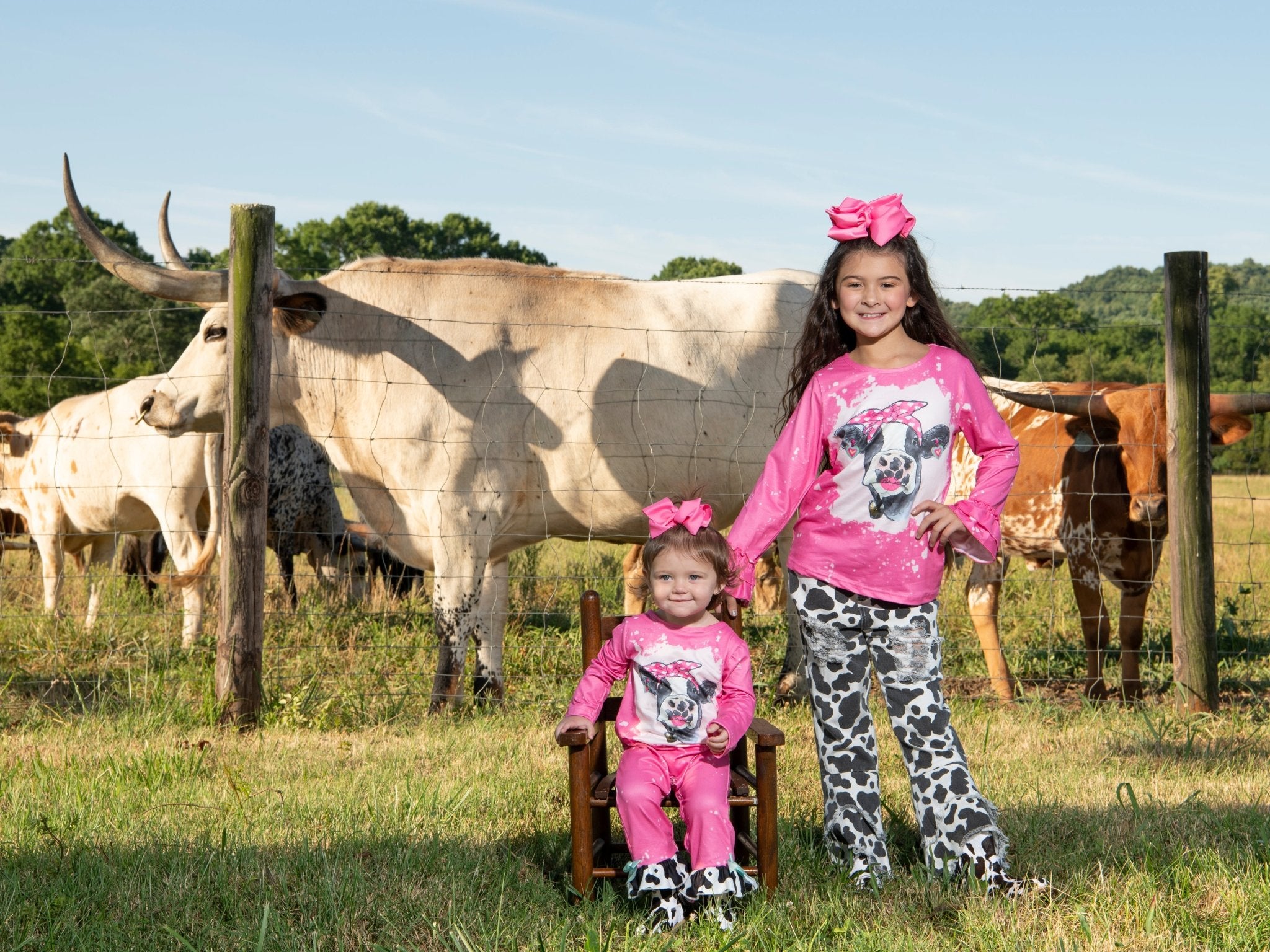 Pink Bleached Cow Top & Distressed Pants Outfit - Marie Nicole Clothing