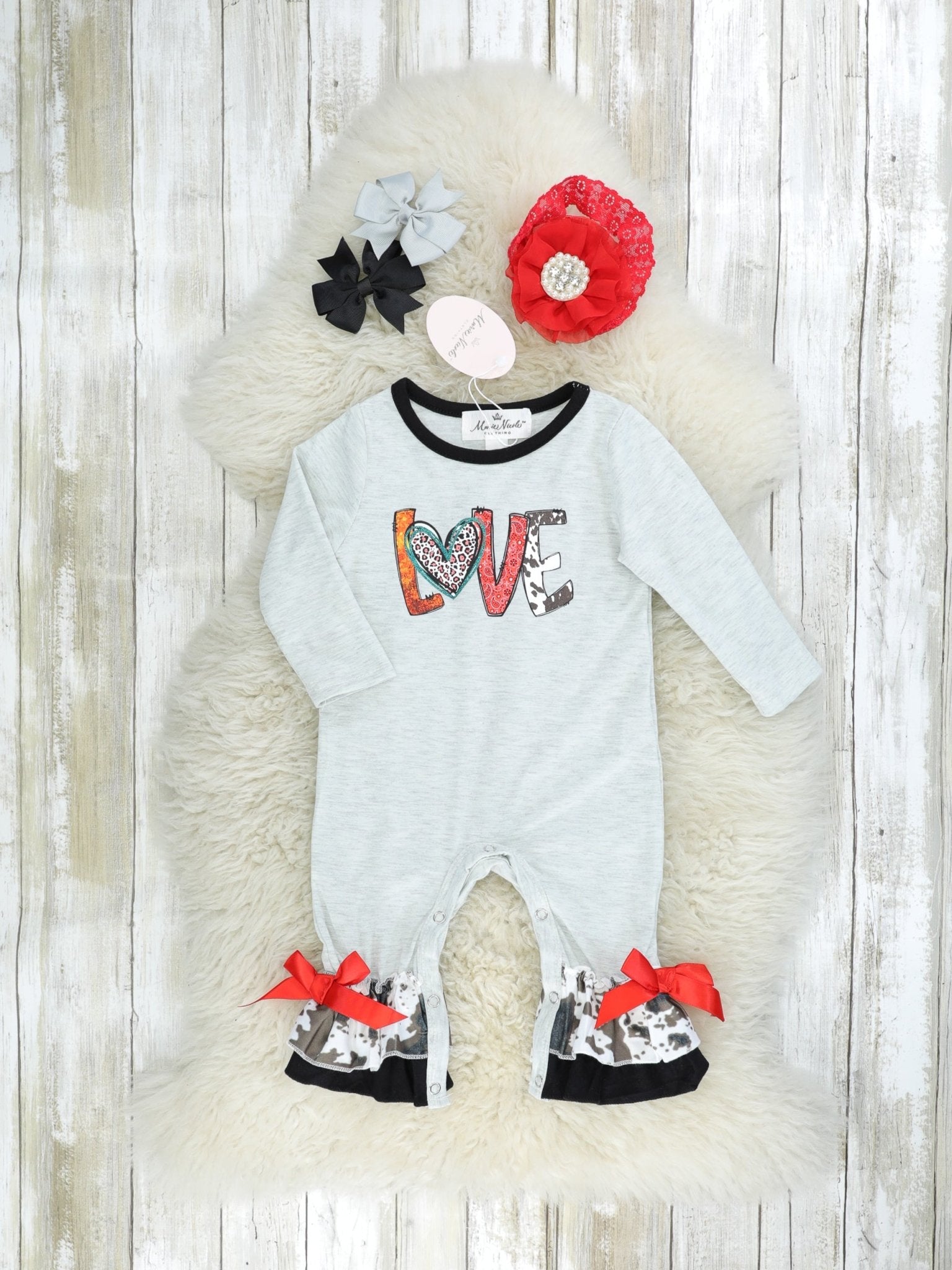 "LOVE" Cow Print Ruffle Romper - Marie Nicole Clothing