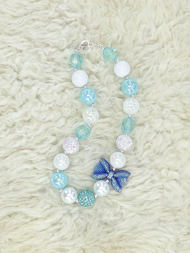 Icy Blue Bow Bubblegum Necklace - Marie Nicole Clothing